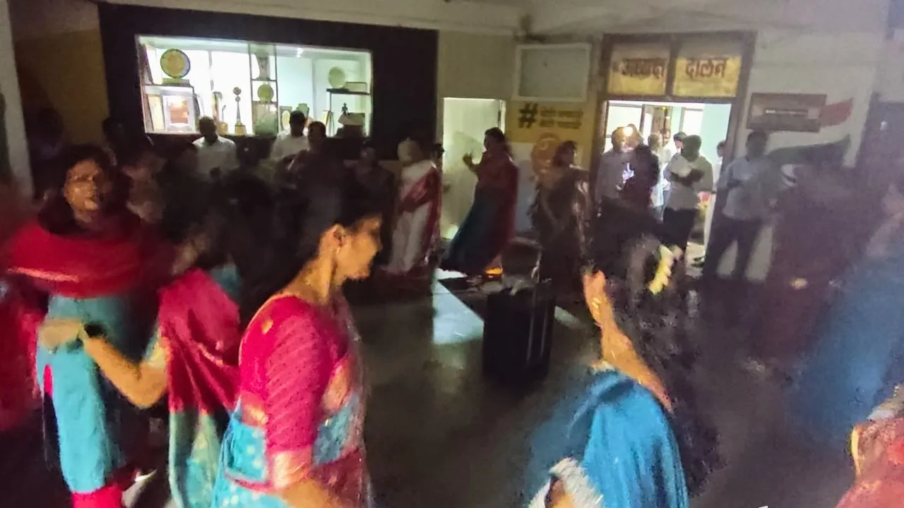 Women officials and members of Sindhudurg Zilla Parishad celebrating Navratri with Garba and traditional Fugdi dances.