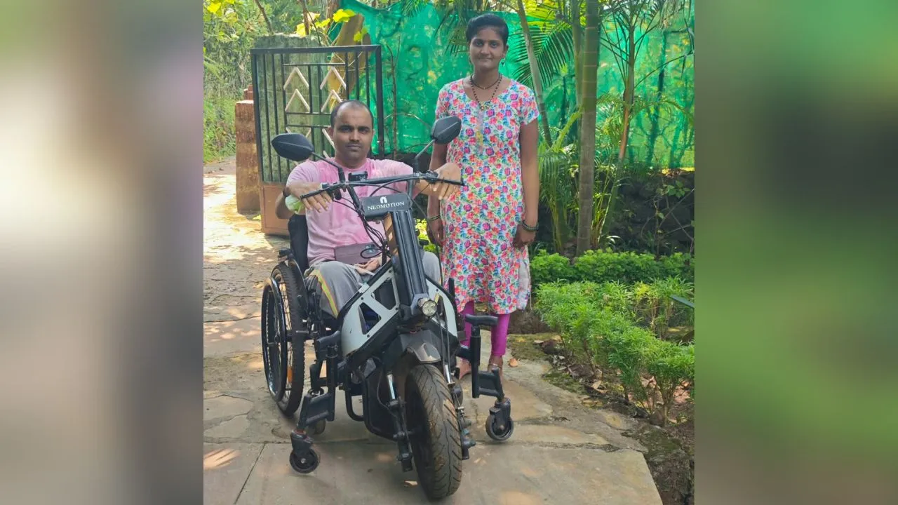 Gurunath Dongale with NeoMotion electric vehicle provided through Sadik Nakade and RHP Foundation