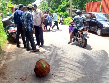 Woman, child hurt as   boulder hits scooter