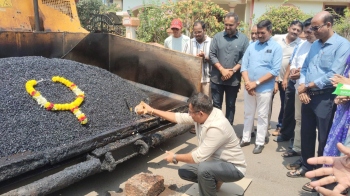 Hotmixing of roads begins   at PDA Colony, Nova Cidade