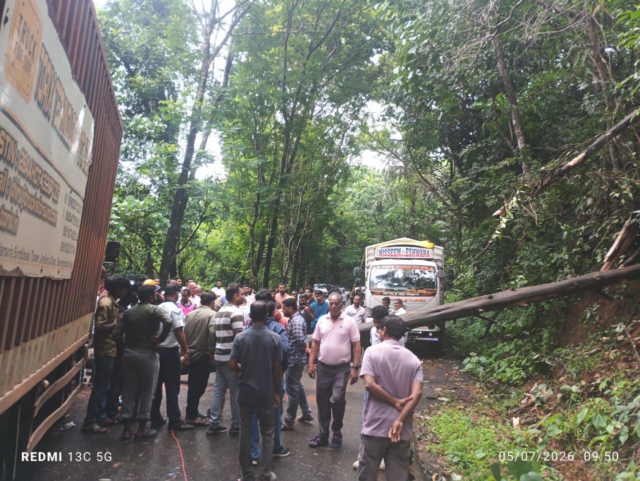 Huge fallen trees block   highway near Anjunem Dam